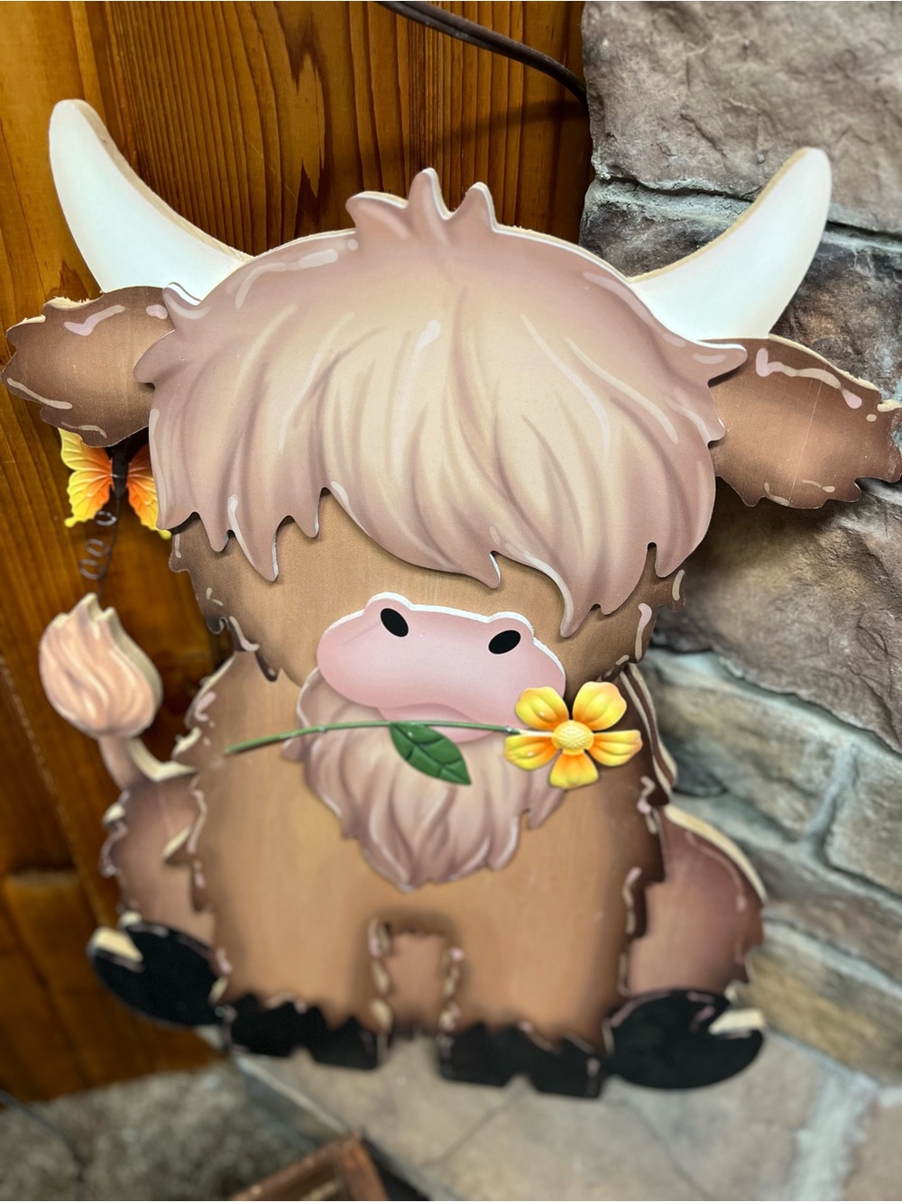 Whimsical Brown Highland Cow Wall Decor with Yellow Flower